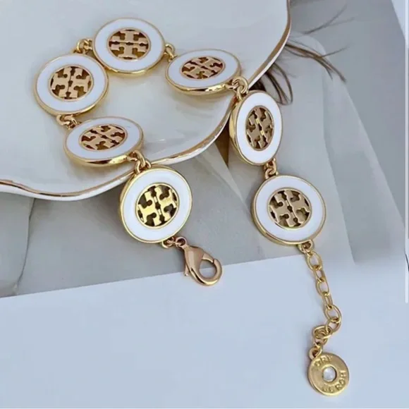 Authentic Tory Burch 18 Gold Plated White and Gold Enamel Logo Link Bracelet New - Picture 1 of 8